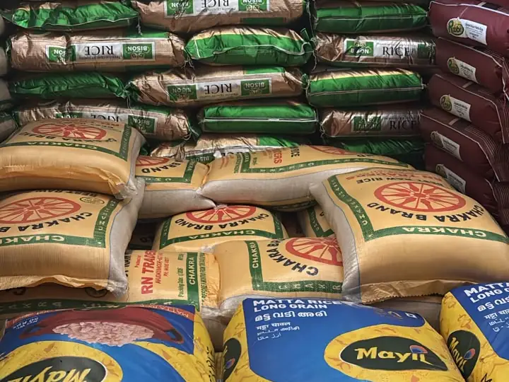 Sacks of Bison, Chakra and Mayil matta rice stacked in the warehouse