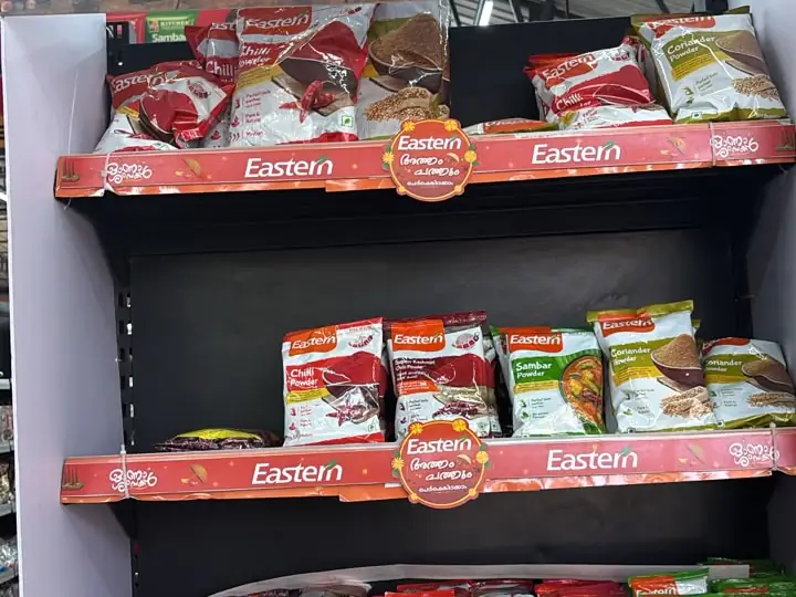 Red shelves of Eastern masala packets