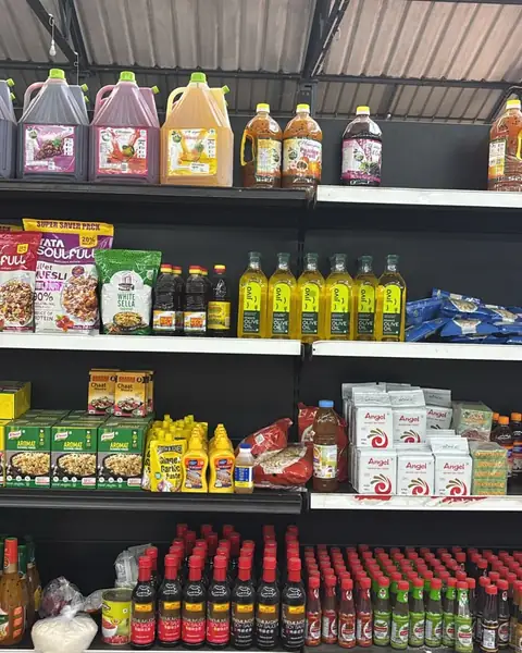 Fruit drink cans, olive oil, sauces and soy sauce bottles