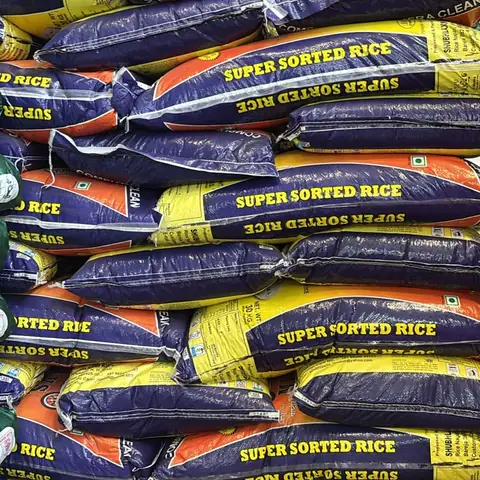 Blue and yellow sacks of Super Sorted rice