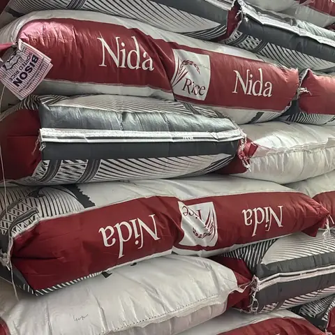 Red and white sacks of Nida rice